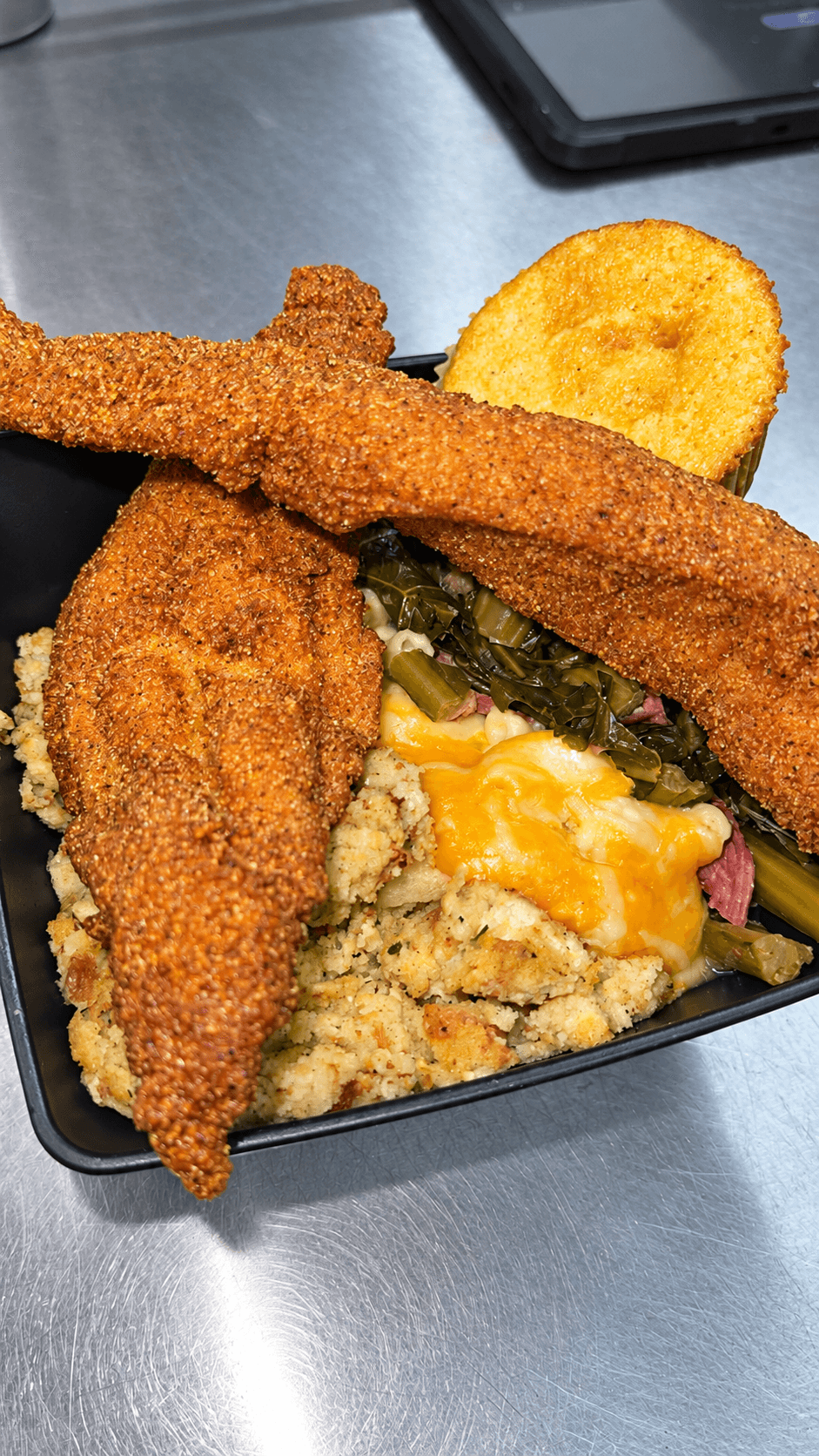 Kings Kitchen and Cocktails fried fish plate with sides and cornbread
