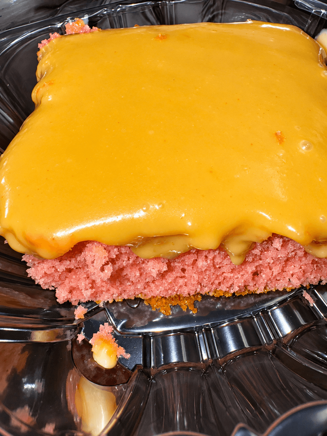 Pink cake with gold glaze from Kings Kitchen and Cocktails